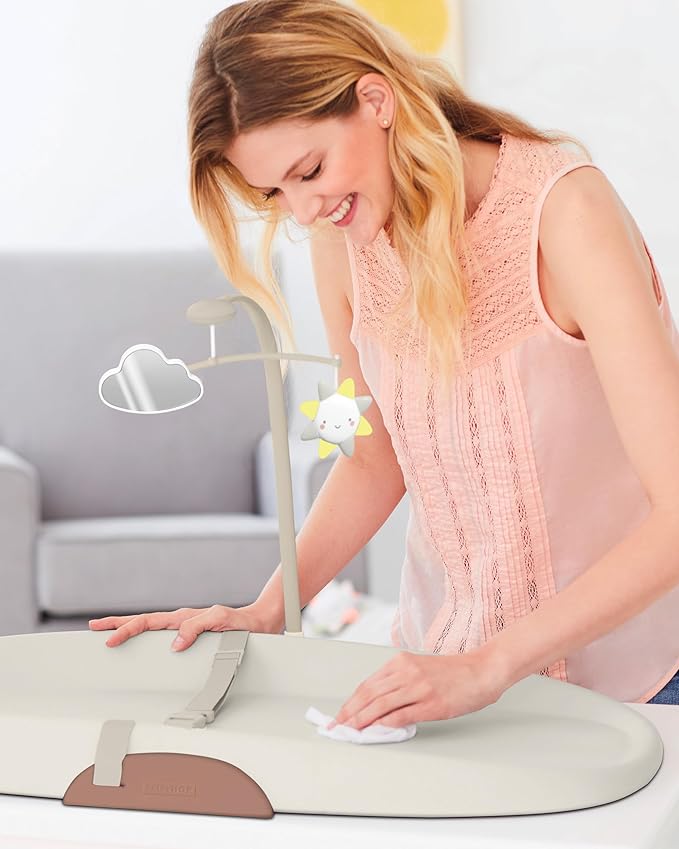 Skip Hop Baby Changing Pad Nursery Style Wipe-Clean Contoured with Cushioned Foam, Non-Skid Base, Built-in Safety Belt & Tuck-Away Toy Bar Fits Standard Changing Tables, Oat