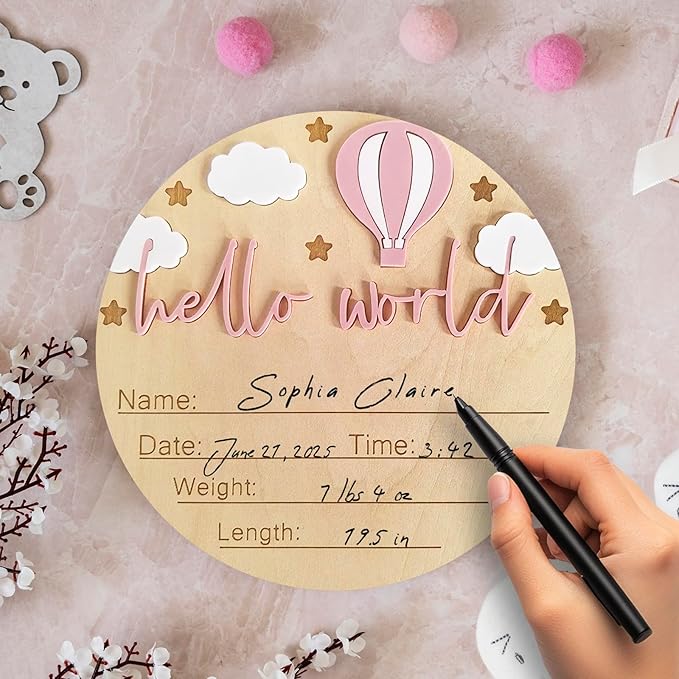 Hello World Newborn Sign - 5.9” Round Wooden Baby Announcement Sign with 3D Hot Air Balloon, Clouds & Stars - Keepsake Birth Gift for Baby Girl’s First Day, Hospital, Shower, or Nursery Décor (Pink)