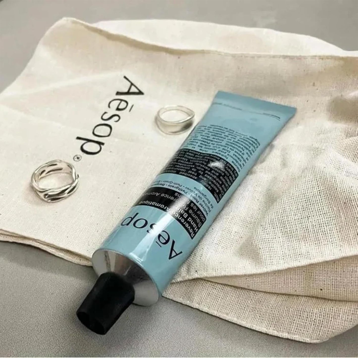 Aesop Reverence Aromatique Travel Size Hand Balm | Lotion that Gently Exfoliates Dry Hands + Nourishes with Macadamia Seed Oil and Shea Butter | 2.4 oz / 75 mL (Pack of 2)